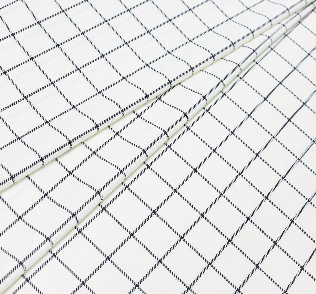 Ткань смесовая диагонального плетения. Цвет белый в черную клетку в наличии