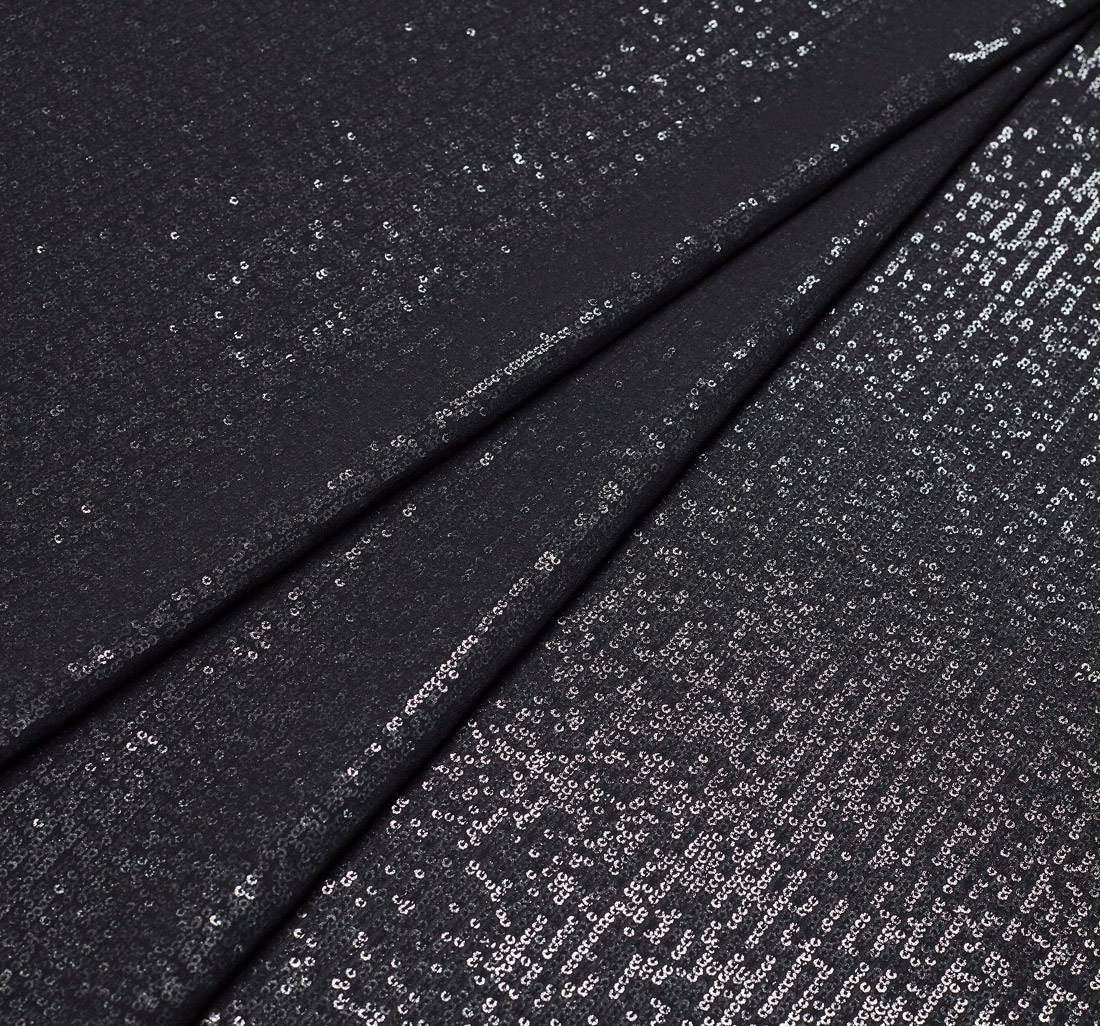 Сетка, расшитая пайетками, покрытая жоржетом. Цвет черный в наличии